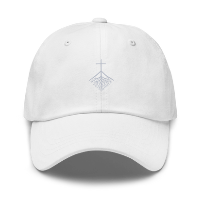 CLVRY Cap, Whiteout Edition: white cap with a tone-on-tone printed cross-and-roots logo (front)