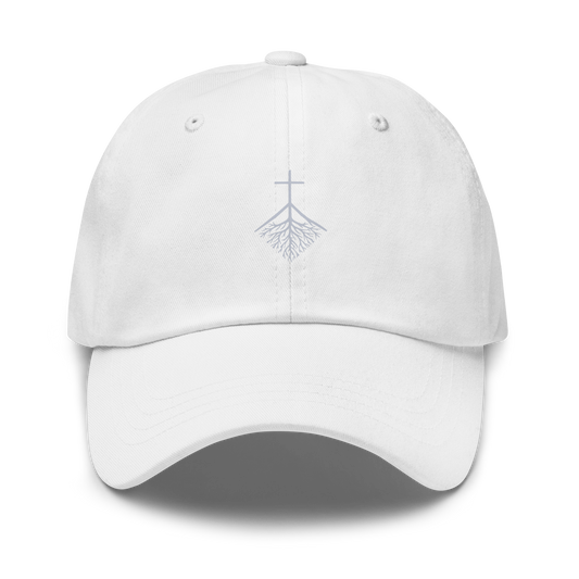 CLVRY Cap, Whiteout Edition: white cap with a tone-on-tone printed cross-and-roots logo (front)